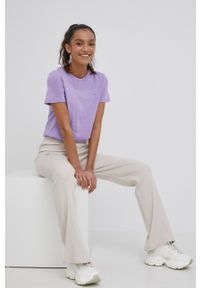 Tommy Jeans spodnie damskie kolor beżowy gładkie. Stan: podwyższony. Kolor: beżowy. Materiał: dzianina, materiał, wiskoza. Wzór: gładki