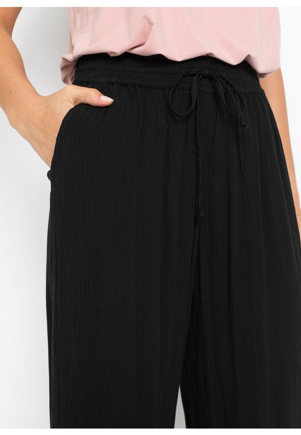 bonprix - Spodnie culotte z koronką. Kolor: czarny. Materiał: koronka. Wzór: koronka