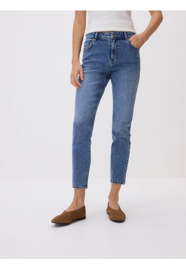 Reserved - Jeansy slim - niebieski. Kolor: niebieski