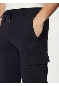 Guess Spodnie dresowe Z4YB08 K9V31 Granatowy Regular Fit. Kolor: niebieski. Materiał: bawełna #4