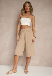 Renee - Beżowe Luźne Spodnie 3/4 z Kieszonkami Efrinea. Okazja: na co dzień. Kolor: beżowy. Materiał: guma. Styl: elegancki, casual