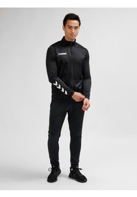 Zestaw dresów sportowych dla dorosłych Hummel Promo Poly Suit. Kolor: czarny. Materiał: dresówka