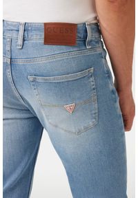 Guess - GUESS Błękitne męskie spodnie jeansowe Angels, Rozmiar 31/34. Kolor: niebieski #2