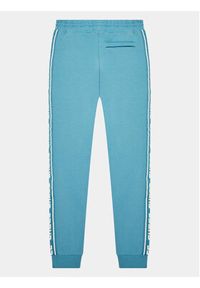 Guess Spodnie dresowe L2YQ48 K6ZS1 Niebieski Regular Fit. Kolor: niebieski. Materiał: bawełna #3