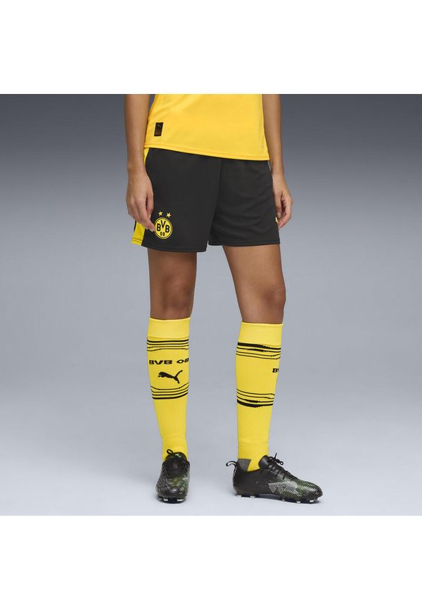 Puma - Damskie szorty Borussia Dortmund 25/26 PUMA Black Faster Yellow. Kolor: czarny, wielokolorowy, żółty. Materiał: tkanina. Sport: fitness, piłka nożna
