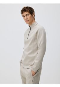 Reserved - Bluza ze stójką - jasnoszary. Kolor: szary. Materiał: dzianina. Wzór: gładki #1