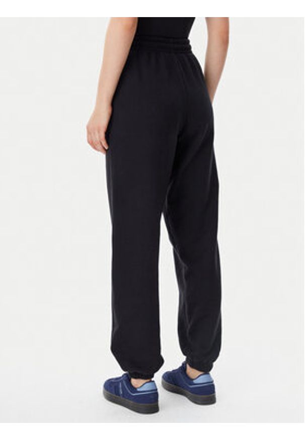Tommy Jeans Spodnie dresowe Script DW0DW20670 Czarny Relaxed Fit. Kolor: czarny. Materiał: bawełna
