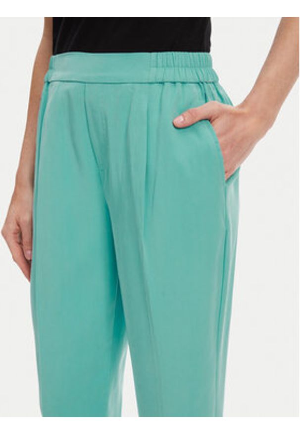 United Colors of Benetton - United Colors Of Benetton Spodnie materiałowe 4Y09DF079 Zielony Regular Fit. Kolor: zielony. Materiał: lyocell