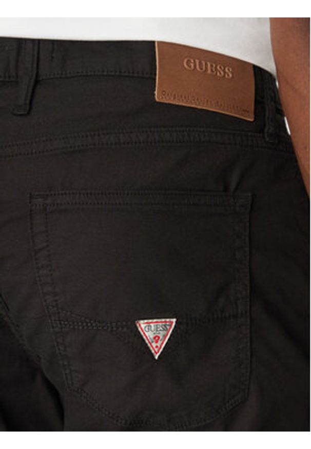 Guess Spodnie materiałowe M5RAS2 WGXW1 Czarny Slim Fit. Kolor: czarny. Materiał: syntetyk