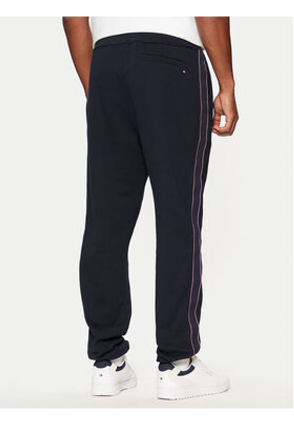 TOMMY HILFIGER - Tommy Hilfiger Spodnie dresowe MW0MW37477 Granatowy Regular Fit. Kolor: niebieski. Materiał: bawełna
