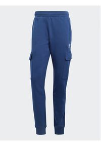 Adidas - adidas Spodnie dresowe adicolor Trefoil IP2757 Granatowy Slim Fit. Kolor: niebieski. Materiał: bawełna