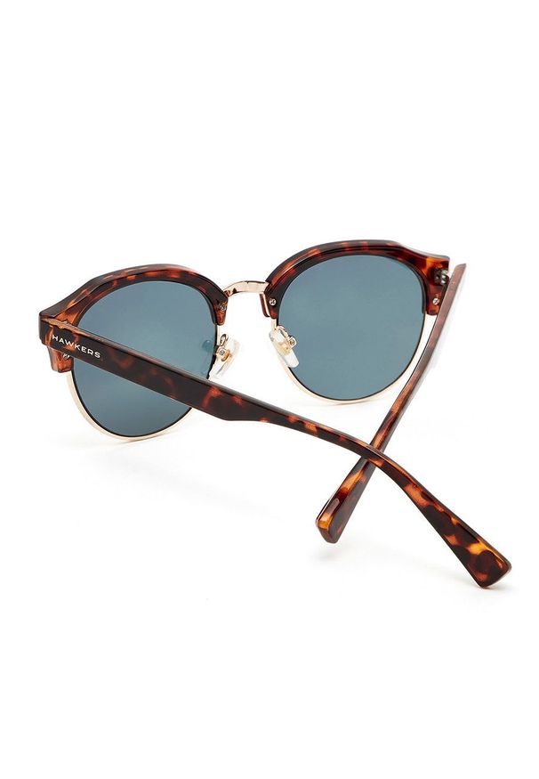 Hawkers - Okulary przeciwsłoneczne CAREY ROSE GOLD CLASSIC. Kształt: okrągłe. Kolor: różowy