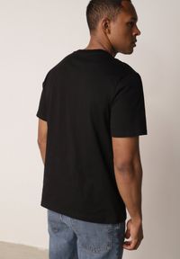 Born2be - Czarna Koszulka T-shirt z Bawełny z Ozdobnym Nadrukiem Daphileia. Okazja: na co dzień. Kolor: czarny. Materiał: bawełna. Długość: krótkie. Wzór: nadruk. Styl: casual #6