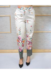 CRISTINAEFFE MILANO - Spodnie w kwiatowy print. Kolor: beżowy. Wzór: kwiaty, nadruk. Sezon: wiosna. Styl: klasyczny #1