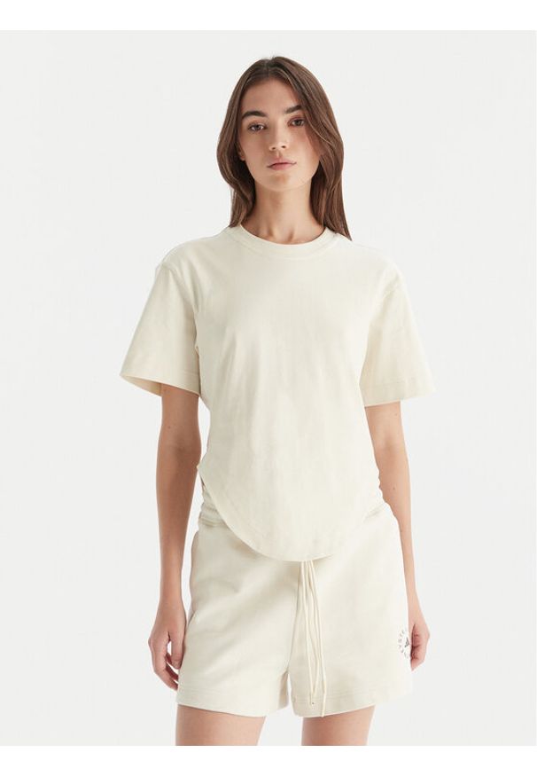 Adidas by Stella McCartney - adidas by Stella McCartney T-Shirt JX6775 Beżowy Regular Fit. Kolor: beżowy. Materiał: bawełna