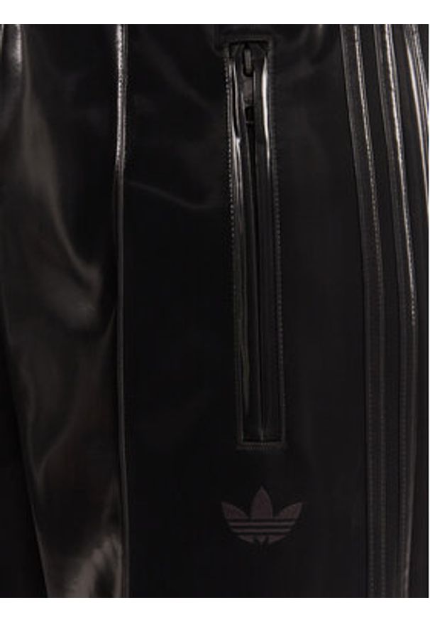 Adidas - adidas Spodnie dresowe adicolor Holiday JV7503 Czarny Loose Fit. Kolor: czarny. Materiał: wiskoza