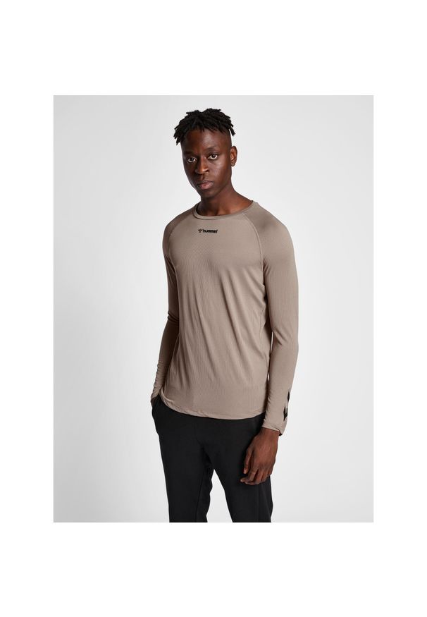 Koszulka z długim rękawem Hummel MT Bow. Kolor: wielokolorowy, szary, zielony. Materiał: poliester. Długość rękawa: długi rękaw. Długość: długie. Sport: piłka ręczna