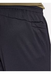 Under Armour Spodnie dresowe Ua Armour Fleece Joggers 1373362 Czarny Loose Fit. Kolor: czarny. Materiał: syntetyk, dresówka #3