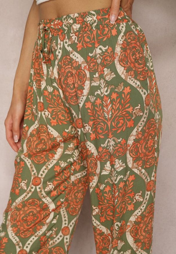 Renee - Ciemnobeżowe Wiskozowe Spodnie Boho High Waist z Szerokimi Nogawkami i Gumką w Talii Tiamarra. Okazja: na co dzień. Stan: podwyższony. Kolor: beżowy. Materiał: wiskoza. Sezon: lato. Styl: boho