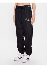 Adidas - adidas Spodnie dresowe IJ8751 Czarny Loose Fit. Kolor: czarny. Materiał: syntetyk #1