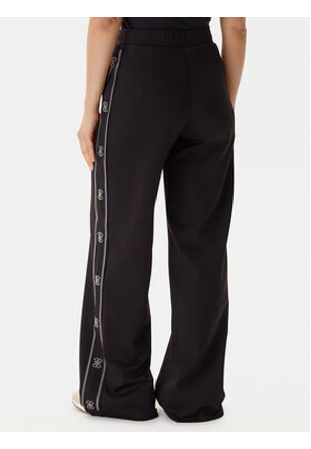 Guess Spodnie dresowe V5BB12 KCX22 Czarny Wide Leg. Kolor: czarny. Materiał: syntetyk