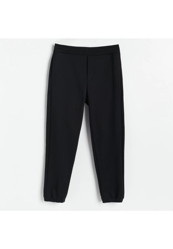 Reserved - PREMIUM Spodnie dresowe - Czarny. Kolor: czarny. Materiał: dresówka