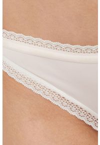 Calvin Klein Underwear stringi (3-pack) kolor beżowy. Kolor: beżowy. Materiał: materiał. Wzór: gładki