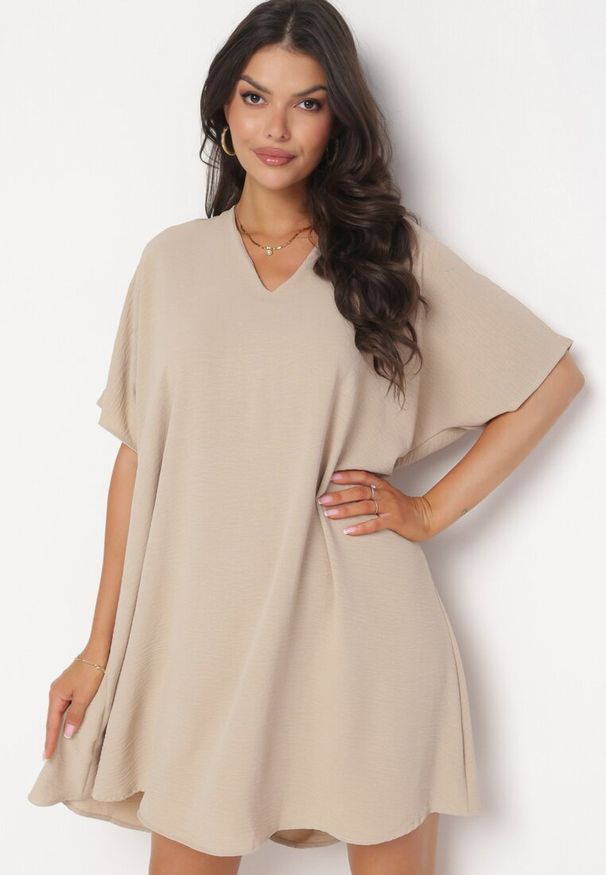 Born2be - Beżowa Sukienka o Fasonie Nietoperza z Wiązaniem na Plecach Miken. Kolor: beżowy