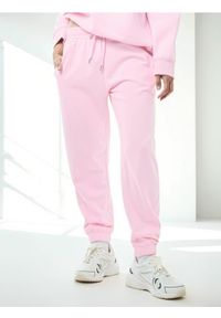 Sinsay - Spodnie dresowe jogger - różowy. Kolor: różowy. Materiał: dresówka