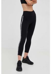 DKNY - Dkny legginsy damskie kolor czarny z nadrukiem. Stan: podwyższony. Kolor: czarny. Materiał: skóra, dzianina, materiał. Wzór: nadruk #1