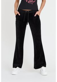 Juicy Couture - JUICY COUTURE Czarne spodnie Caisa Ultra Low Rise. Kolor: czarny