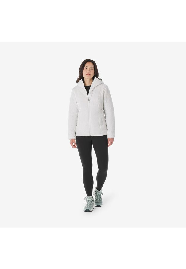 FORCLAZ - Kurtka trekkingowa zimowa damska Forclaz MT100. Kolor: biały. Materiał: poliester, poliamid, materiał. Sezon: zima. Sport: turystyka piesza