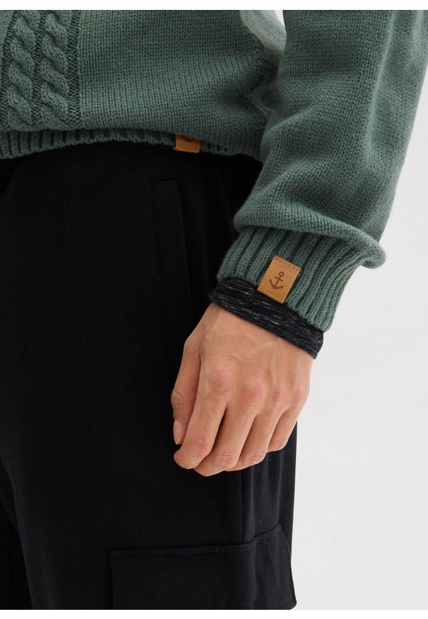 bonprix - Spodnie sportowe bojówki loose fit. Kolor: czarny. Styl: sportowy