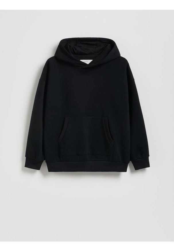 Reserved - Bluza oversize z kapturem - czarny. Typ kołnierza: kaptur. Kolor: czarny. Materiał: dzianina, bawełna