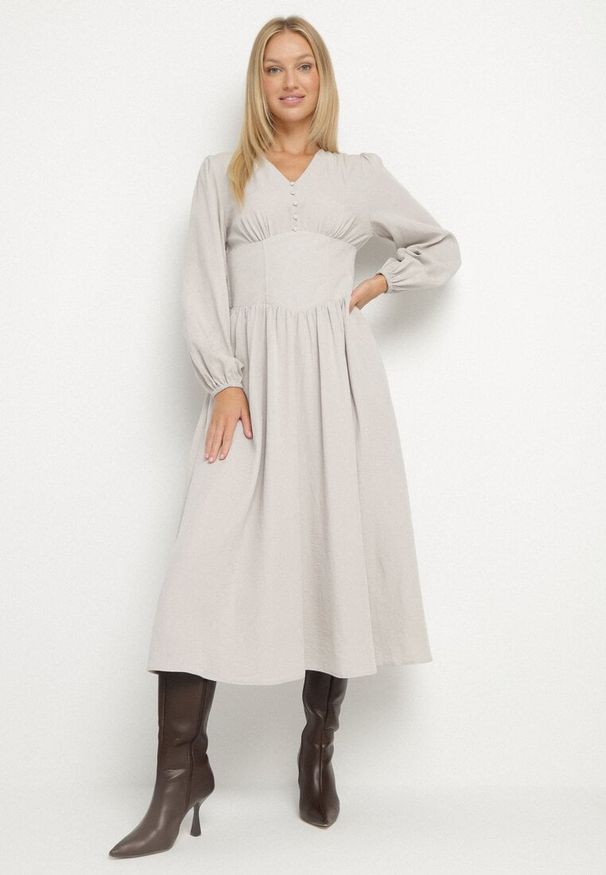 Born2be - Jasnobeżowa Sukienka z Wiskozą z Gorsetową Talią i Bufiastymi Rękawami Aniste. Okazja: na co dzień. Typ kołnierza: dekolt gorset. Kolor: beżowy. Materiał: wiskoza. Typ sukienki: gorsetowe. Styl: wizytowy, sportowy, casual, elegancki