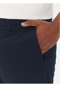 BOSS Spodnie materiałowe T_Commuter-Slim 50534303 Granatowy Slim Fit. Kolor: niebieski. Materiał: syntetyk
