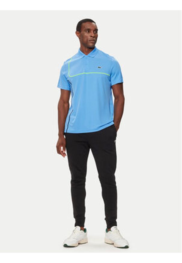 Lacoste Polo DH7362 Niebieski Regular Fit. Typ kołnierza: polo. Kolor: niebieski. Materiał: syntetyk