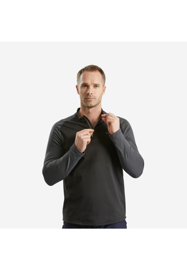 quechua - Koszulka turystyczna męska z długim rękawem Quechua SH100 Warm. Typ kołnierza: kołnierzyk stójkowy. Kolor: czarny. Materiał: poliester, poliamid, materiał, elastan. Długość rękawa: długi rękaw. Długość: długie. Sport: turystyka piesza