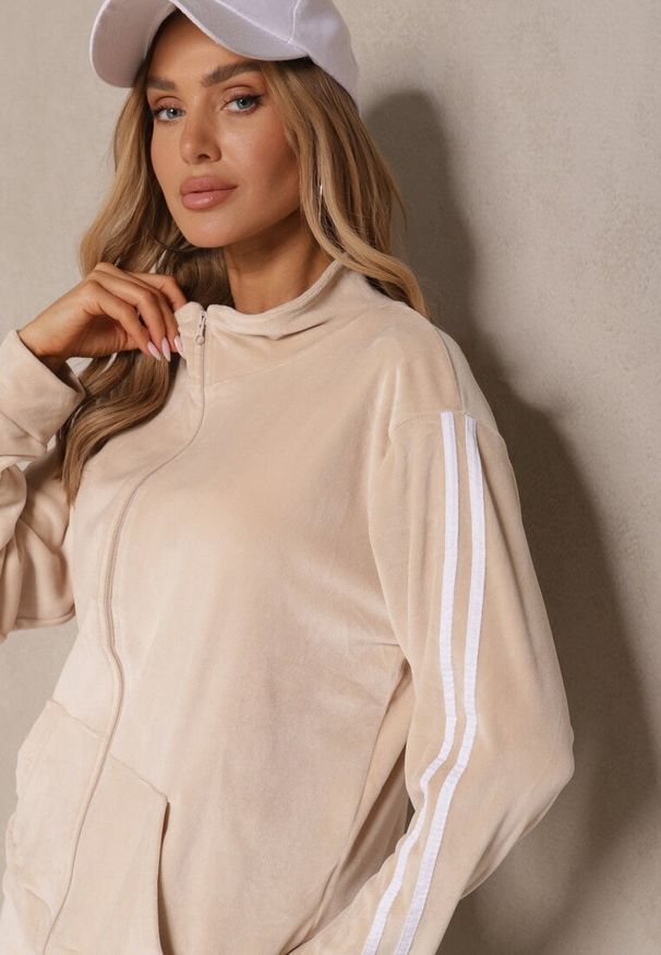 Renee - Beżowy Komplet Dresowy Spodnie i Bluza Rozpinana Ozdobiona Paskami Mirwia. Kolor: beżowy. Materiał: dresówka. Wzór: aplikacja