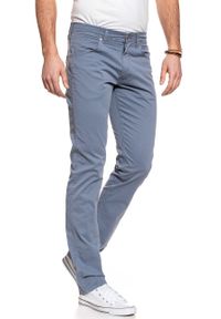 Wrangler - WRANGLER SPODNIE MĘSKIE GREENSBORO FLINSTONE BLUE W15QMM13F. Materiał: materiał #6