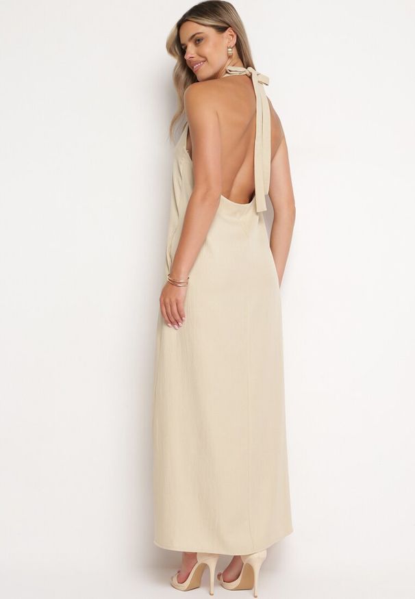 Born2be - Beżowa Sukienka z Wiązaniem na Szyi i Kieszeniami o Trapezowym Kroju Nestatasha. Kolor: beżowy. Typ sukienki: trapezowe