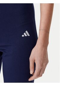 Adidas - adidas Legginsy Essentials Small Logo JD3073 Granatowy Flare Fit. Kolor: niebieski. Materiał: bawełna