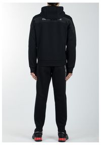 Emporio Armani - EMPORIO ARMANI Spodnie dresowe męskie, Rozmiar L. Kolor: czarny. Materiał: dresówka. Wzór: nadruk