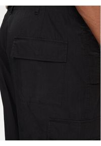Champion Spodnie materiałowe 220015 Czarny Custom Fit. Kolor: czarny. Materiał: bawełna