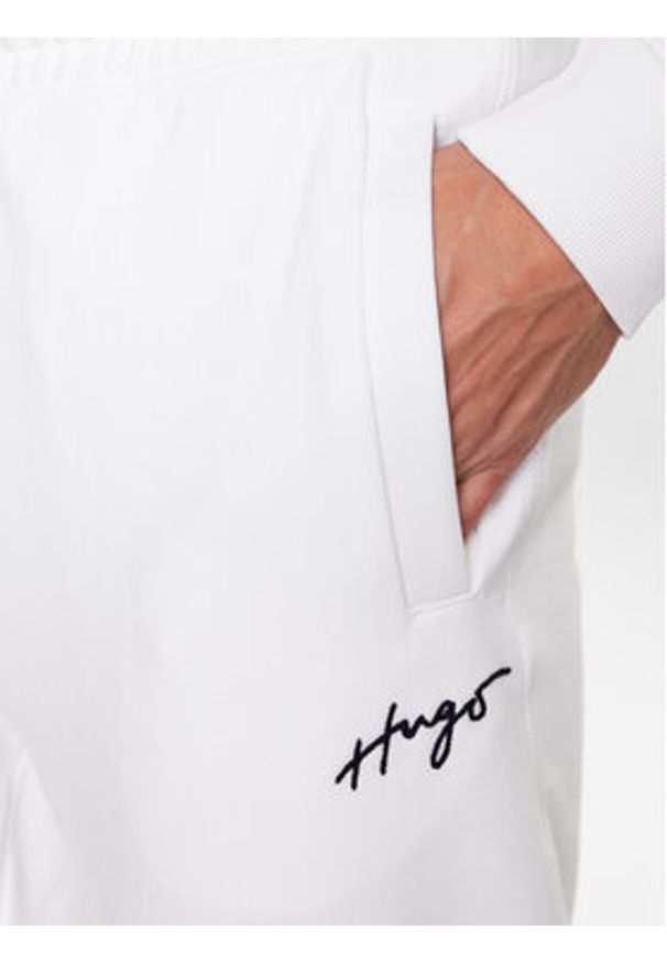 Hugo Spodnie dresowe Drasillia 50486457 Biały Relaxed Fit. Kolor: biały. Materiał: dresówka, bawełna