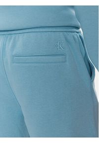 Calvin Klein Jeans Szorty sportowe Monologo J30J325131 Niebieski Regular Fit. Kolor: niebieski. Materiał: bawełna, syntetyk. Styl: sportowy #5
