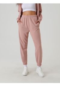 Sinsay - Spodnie dresowe jogger - różowy. Kolor: różowy. Materiał: dresówka #1