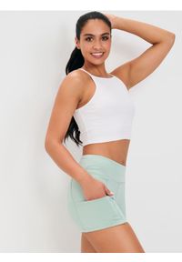 Sinsay - Dopasowane szorty sportowe Gym Hard - zielony. Kolor: zielony. Styl: sportowy