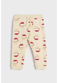 Sinsay - Spodnie dresowe - kremowy. Kolor: kremowy. Materiał: dresówka. Długość: długie. Styl: wizytowy #1