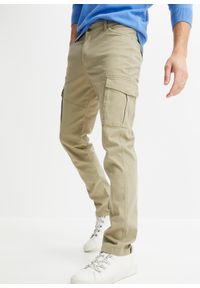bonprix - Spodnie bojówki Slim Fit Straight ze stretchem. Kolor: beżowy
